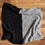 Couverture bicolore noir et gris au crochet pour bébé