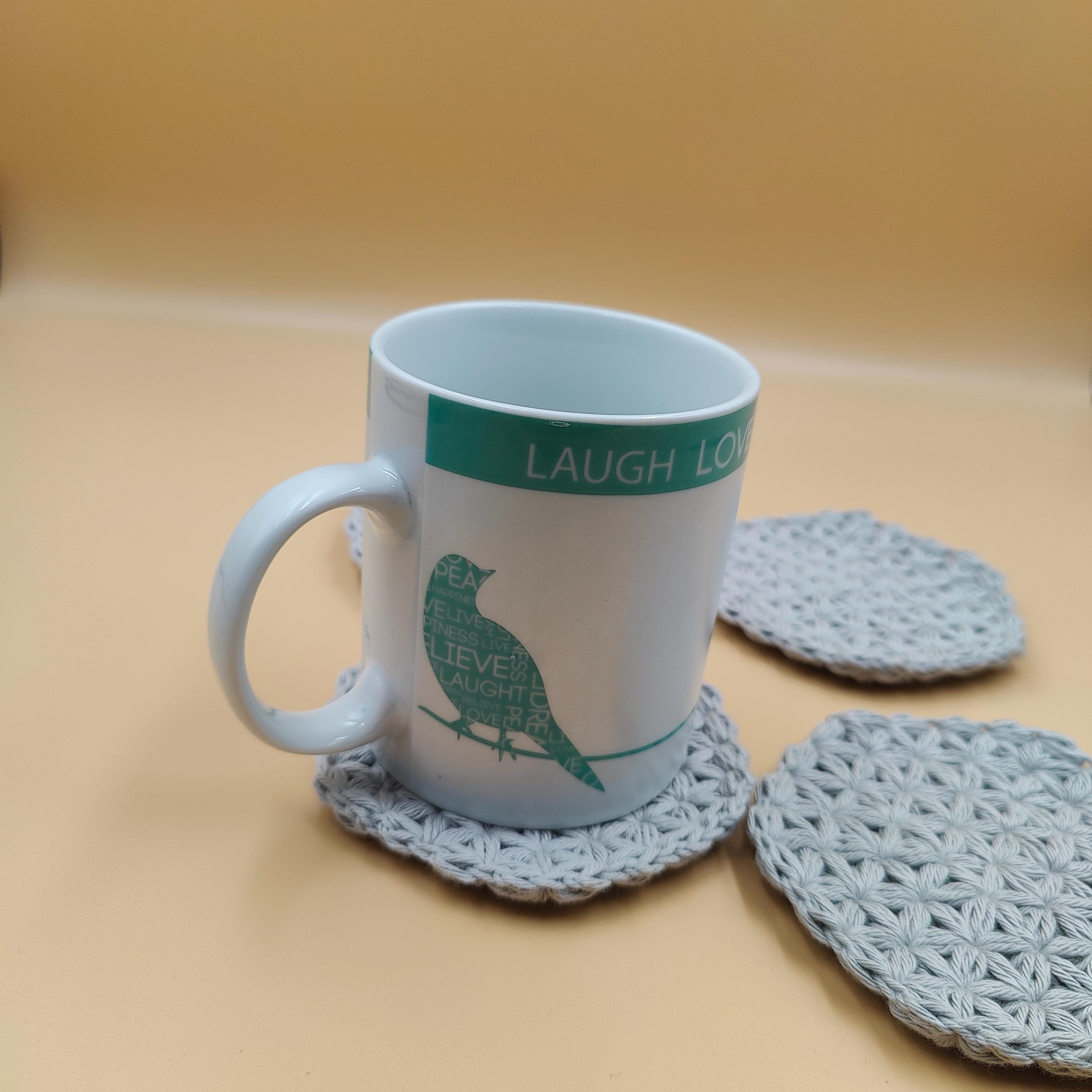 Lot de quatre dessous de verres/tasses grise au crochet