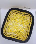 Panier de rangement au crochet jaune et noir