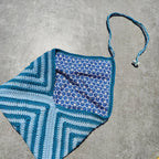 Pochette artisanale au crochet avec motif tourbillon et doublure en tissu japonais