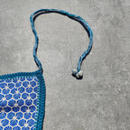 Pochette artisanale au crochet avec motif tourbillon et doublure en tissu japonais