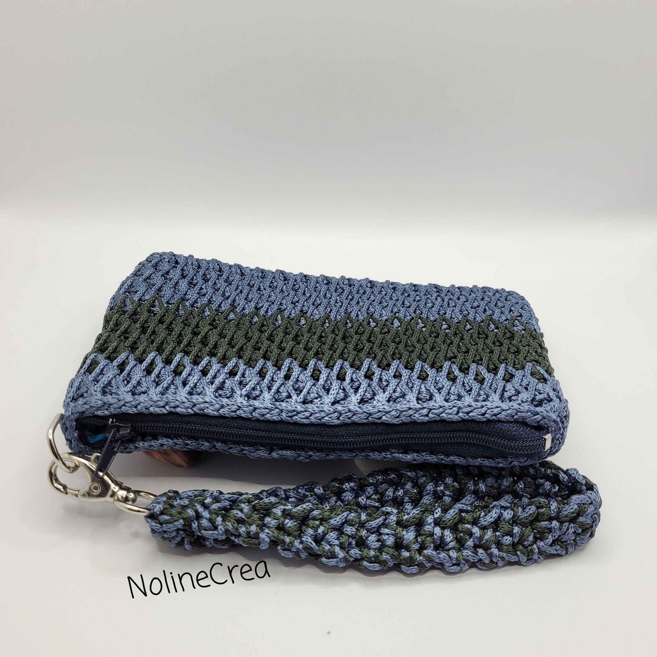 petite pochette noir et verte, anse poignet
